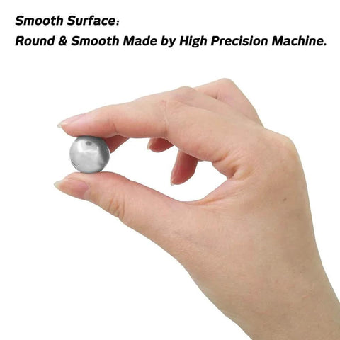Hand holding a 0.3mm Solid 316L Stainless Steel Ball with smooth surface, demonstrating size and finish, part of 100Pcs ball set.