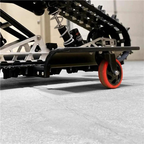 Trax Wheels 2.0 Rear Wheel Casters For Snowmobiles And Snow Bikes, installed, heavy duty, side view with oversized wheels.