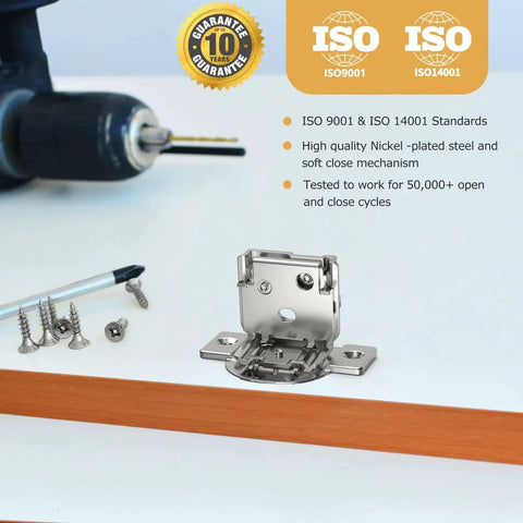 10 Pack Soft Close Hinges For Face Frame Cabinets One And A Quarter Inch Overlay 105 Degree Opening Concealed Self Closing Stainless Steel Kitchen Cabinet Hardware With 4D Adjustment. Hinge close-up on tabletop with drill and screws.