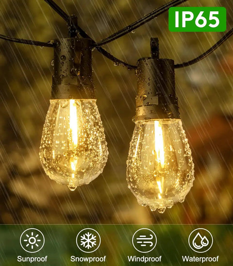 Close-up of Solar Outdoor String Lights 50 Feet Waterproof LED Edison S14 Bulbs in rain hanging outdoors.