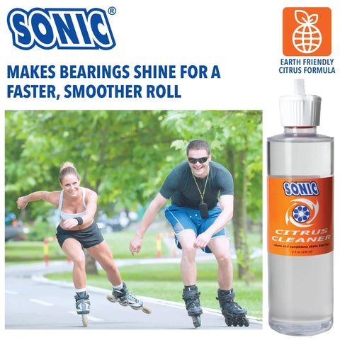 Pair of skaters using Sonic Citrus Power Bearing Cleaner for inline skates, roller skates, and skateboards with no water, biodegradable.