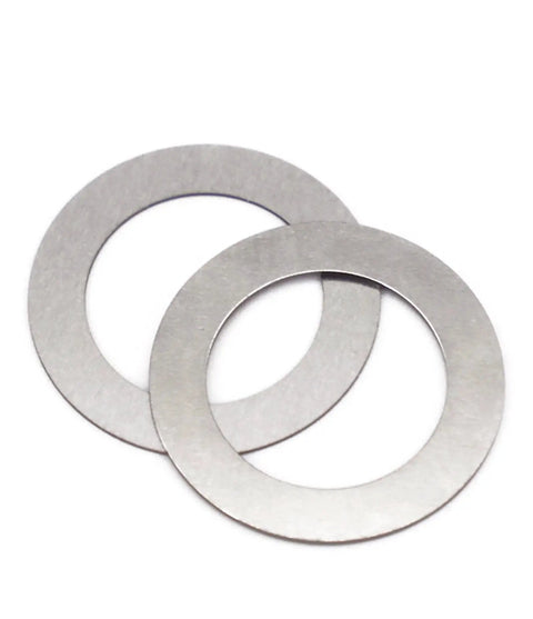 Two stainless steel shims from the 14 Pack Half Inch 28 TPI Barrel Shim Kit for .223 and 5.56 Muzzle Brakes.