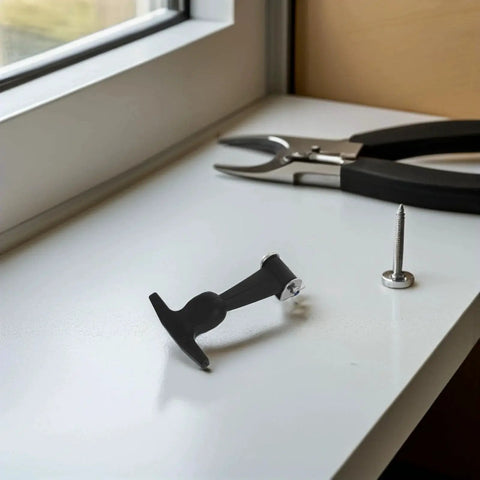 Two-piece black T-handle draw latch set with stainless steel hardware; side view.