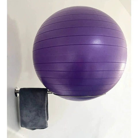 Wall Mounted Stainless Steel Exercise Ball Holder with purple yoga ball and towel, fits 13 to 34 inch balls, includes mounting hardware