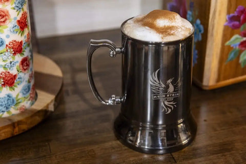Classic Stainless Steel 20 Ounce Double Wall Beer Stein With Easy Grip Handle Vacuum Insulated Tankard Copper Finish with coffee foam.
