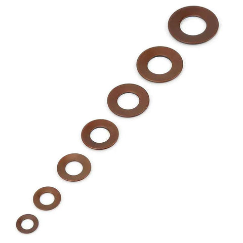 Various sizes of Stainless Steel Belleville Disc Springs for Heavy Loads and Shock Absorption lined up on a white background