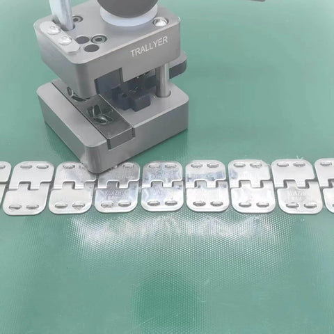 24 Inch Stainless Steel Conveyor Belt Fasteners With Hinge Pin Two Pairs in a box shown with installation tool on green surface