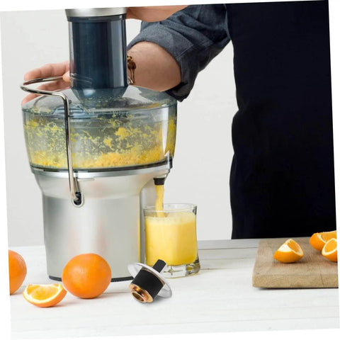 Replacement Coupling Pin for Juicer and Blender Parts With Stainless Steel Construction No Fuss Plug And Play Easy Install And Secure Connection For Smoothies And Food Processing Applications Kitchen Accessory Built To Last next to a juicer in use