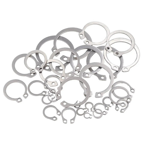 Variety of stainless steel C-clips from the 265 Piece Metric Stainless Steel C Clips External Retaining Ring Assortment Kit by HVAZI.