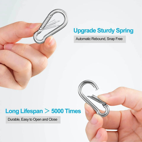 Hands holding 10 Pack Stainless Steel Carabiners Clips 1.57 Inch Small Spring Snap Hooks Heavy Duty Keychain Clips Quick Link
