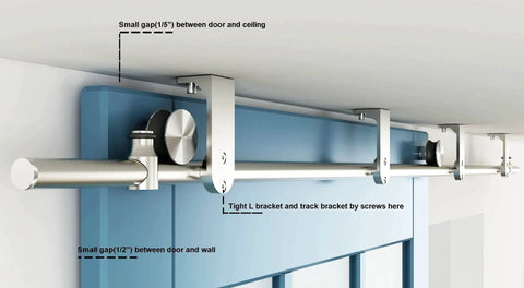 Stainless Steel Ceiling Mount Sliding Barn Door Hardware Kit For Doors One And Three Eighths To One And Three Quarters Inches Thick Supports Up To 198 Lb Includes Two Flat Rollers Two Stoppers Two 3.3 Foot Tracks Track Connector And Four Round Brackets installed on a blue door.