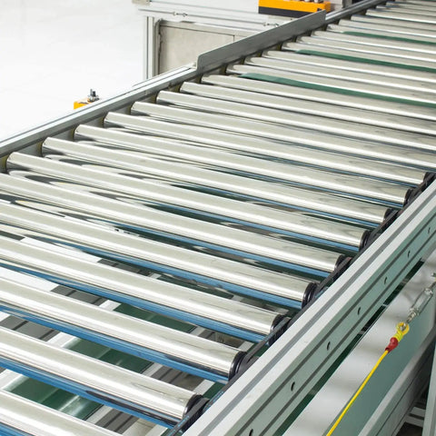 Two Pack 1.5 Inch Conveyor Roller Replacement Set For Gravity Transmission Systems installed on assembly line conveyor.