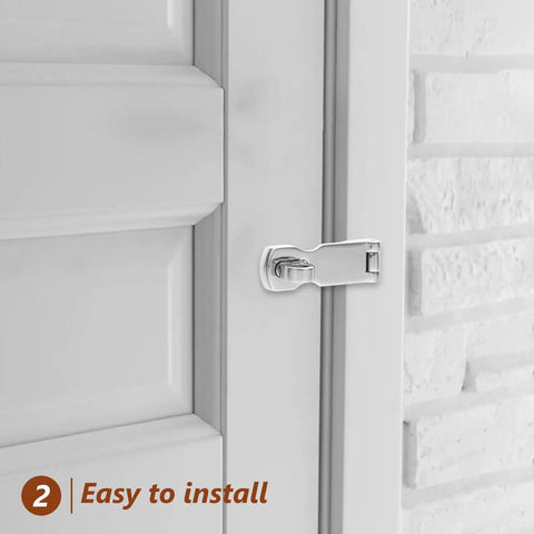 Installed marine-grade stainless steel gate latch on white exterior door