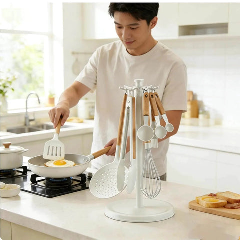 Man cooking with Kitchen Utensil Hanger Stainless Steel Utensil holder Rotatable Cooking Utensils Holder with 8 Hooks in a kitchen