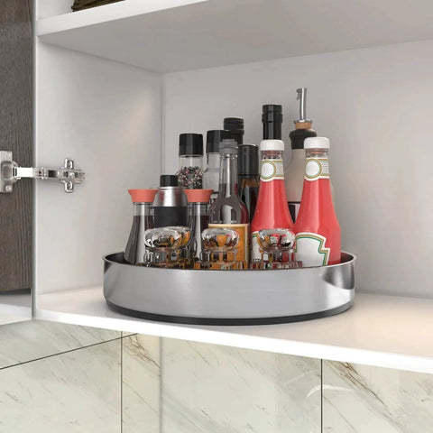 Rotating Lazy Susan Turntable Organizer for Kitchen Cabinets and Countertops, 304 Stainless Steel Silver holding spices and condiments