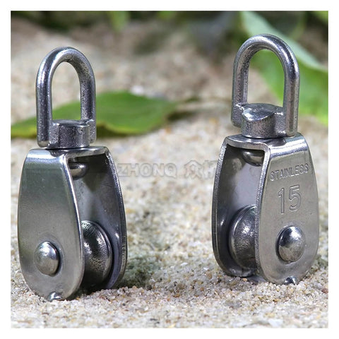Two Stainless Steel Pulley M15 Single Wheel Swivel Lifting Rope Pulley Set Lifting Wheel Tools(M15) on sandy surface