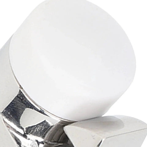 Close-up of round white bumper head on stainless steel marine-grade door stop