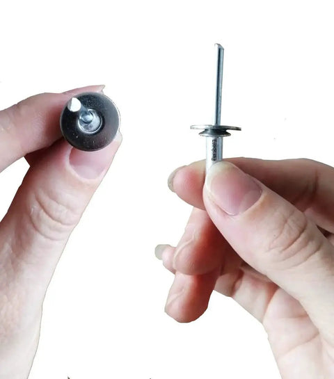 Hands holding 18-8 Stainless Steel Rivet Back-Up Washer for 1/8, 5/32, 3/16 Inch Rivets