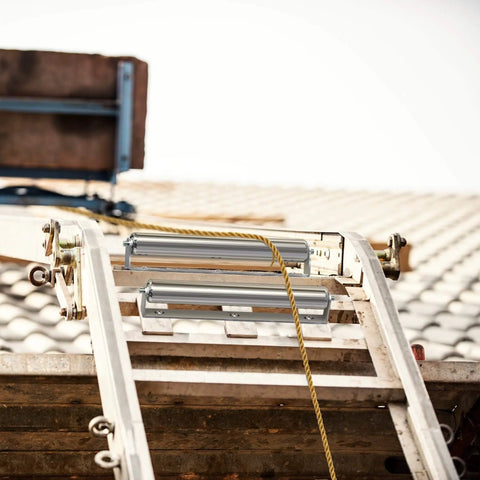 1.5" Diameter Stainless Steel Roller with Bracket Set, 11.8" BF Length, 2-Pack, installed on a ladder for smooth transport use