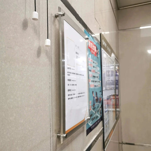 Wall-mounted acrylic sign with Half Inch Diameter Two Inch Stainless Steel Standoff Screws For Wall Mount Sign Holders Elevating Acrylic Signage Ten Pieces Includes Eight By Fifteen Millimeter Thread Five Millimeter Bottom Hole For Panels Up To Eight Millimeter Thick And Ten