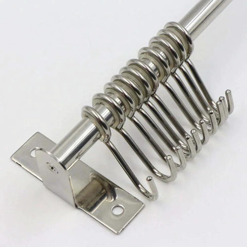 Close-up of Kitchen Sliding Hooks, Stainless Steel Hanging Rack Rail Organize Kitchen Utensil Removable S Hook, wall-mounted.