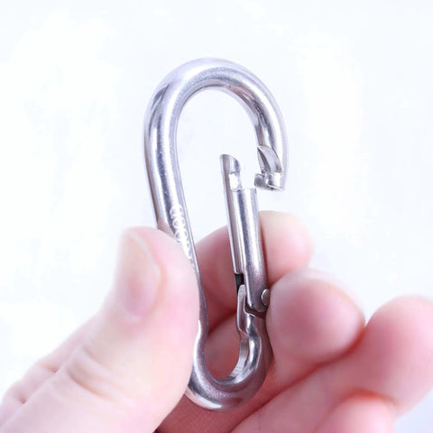 Hand holding 2.4 Inch 304 Stainless Steel Spring Snap Hook Heavy Duty 264 Pound Load Capacity Quick Release Clip
