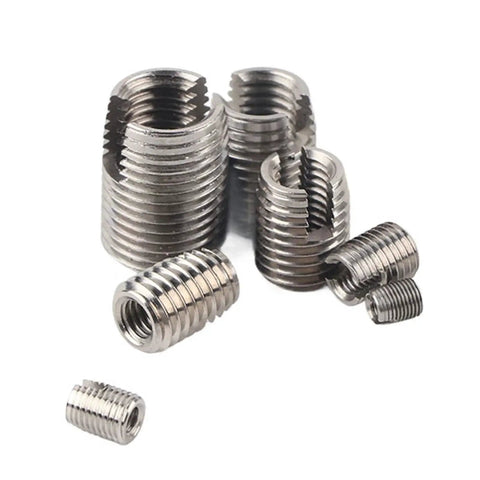 Close-up of 50 Pcs Threaded Inserts Set Self Tapping Stainless Steel Inner Thread For Plastic And Soft Materials
