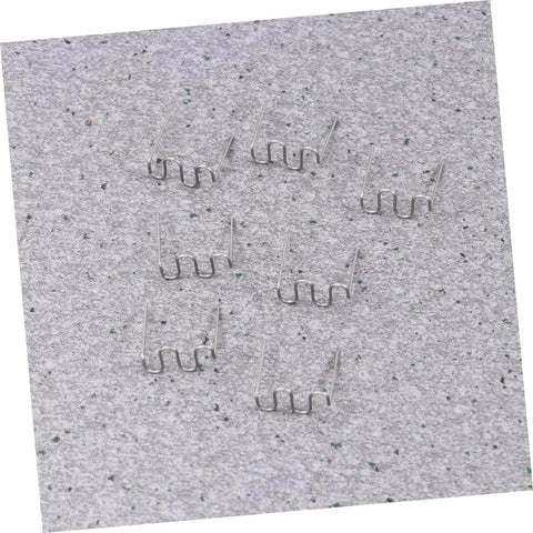 Stainless steel staples from 500 Pcs Auto Body Welding Kit With Plastic Welding Rods And Automatic Stapler Welding Wave Tool on a gray surface