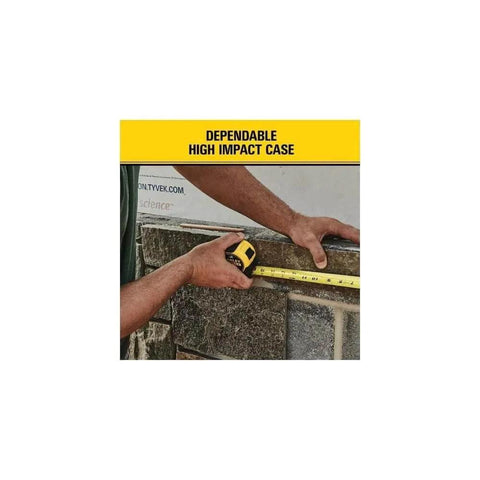 Person using Heavy Duty Tape Measure, 25-Foot (33-725) with high-impact case against wall