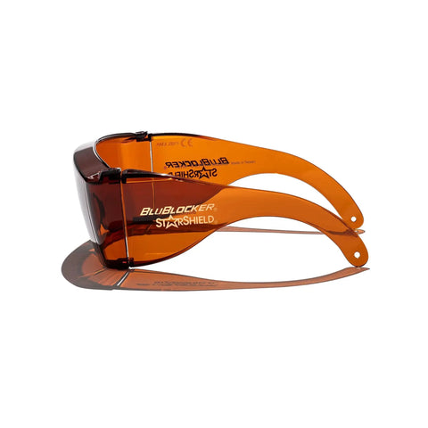 Side view of StarShield Fit Over Sunglasses with amber lenses for blue light blocking and UV protection.