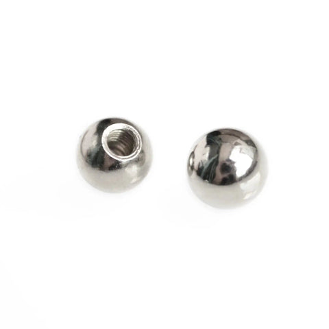 Close-up of two steel ball rod ends from Sixteen Pieces Set Of 10mm M4 Threaded Steel Ball Rod Ends For Kossel Delta 3D Printer Magnetic Ball Joint System