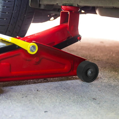 Universal Steel Front Wheel Replacement for Hydraulic Floor Jacks 2.5 Ton to 3.5 Ton installed on red floor jack.