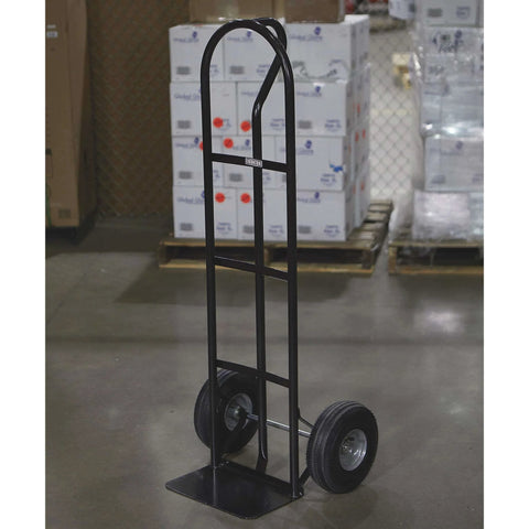 Steel Pneumatic Hand Truck Dolly - 600-Lb. Capacity, 10in. Tires, Powder-Coat Finish standing on warehouse floor.