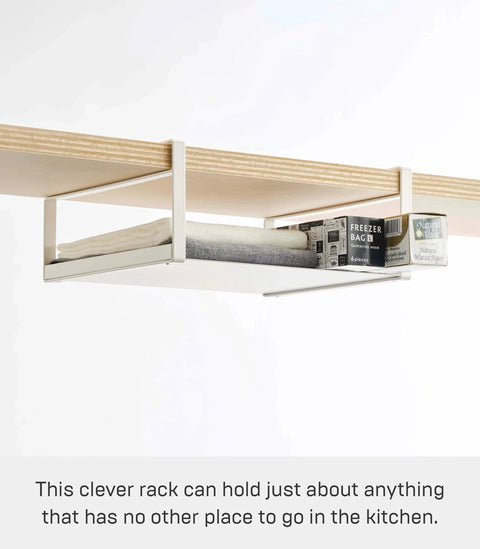 Home Plate Under Shelf Storage Rack - Cabinet Organizer - Steel installed on wooden shelf with boxes and foil.