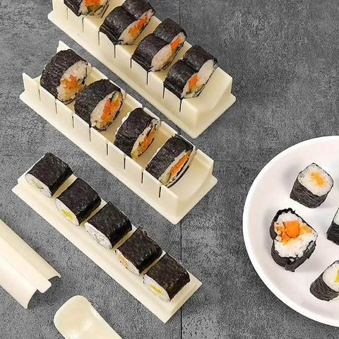 Complete Sushi Making Kit With 3 Shape Molds Rice Roller Tool And Spatula For Pro Looking Home Rolls showing sushi in molds