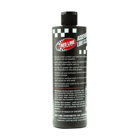 Liquid Synthetic Assembly Lube 12 Ounce From Red Line For Engine Builds bottle, heavy duty lubricant preventing metal contact