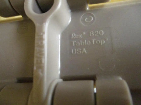 Close-up of Tabletop Industrial Chain By Rexnord With One And A Half Inch Pitch And Three Fourteenth Inch Width Tan Color Heavy Duty