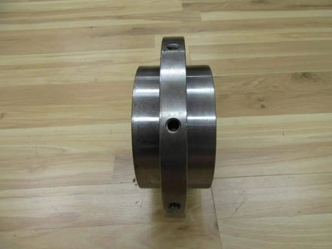 Heavy Duty Taper Lock Hub Two Seven Eighths Inch Stainless Steel For Rexnord 70 HTI STI 7300780 side view on wood surface