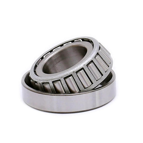 Close-up view of Tapered Roller Bearing LM67048 LM67010, Set of 4, showing inner and outer rings, metal construction.