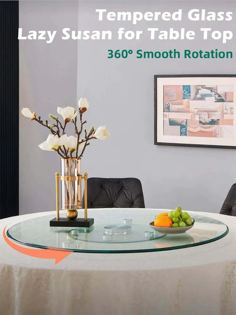 26.7 inch tempered glass lazy susan rotating serving tray on a dining table with smooth rotation, ideal for dining and parties.