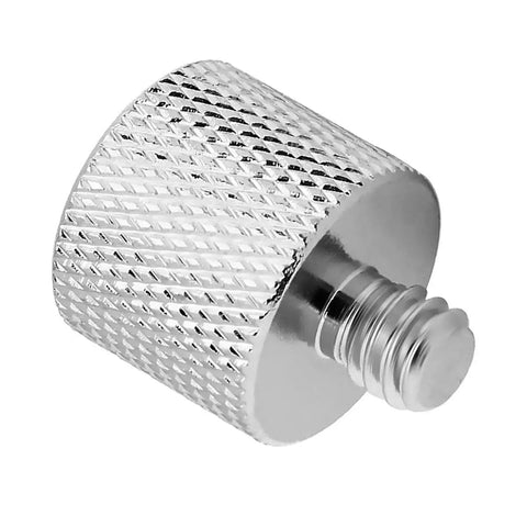 3/8 Inch Female To 1/4 Inch Male Thread Adapter in nickel plated brass for cameras, microphones, and tripods, close-up view