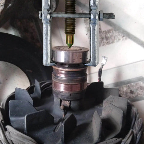 Three Inch Two Jaw Bearing Puller Tool Set With Adjustable Carbon Steel Mandrel Gear Pulley And Flywheel Remover in use