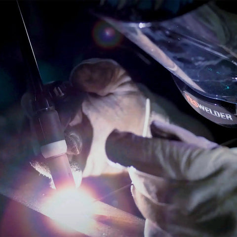Close-up of ER308L Stainless Steel TIG Welding Rod 1/16 x 16 Inches in use, showing welding process with argon shield gas.