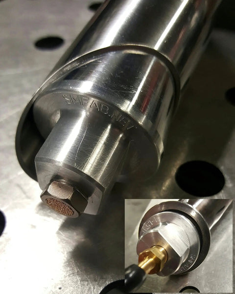 Back Purge Plugs For TIG Welding One To One Point Five Inch Pipe And Tube Set Of Two with tapered fit, close-up view on metal surface.