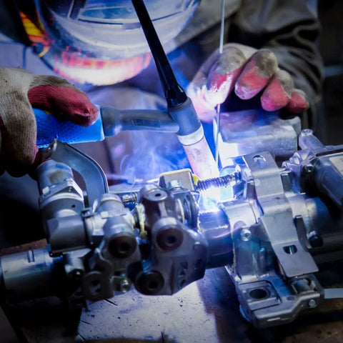 Close-up of ER308L Stainless Steel TIG Welding Rod 1/16 x 16 inches in use for welding metal with argon shield gas