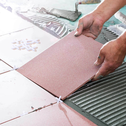 Installing tiles using 500 Piece Wide Tile Spacers And Levelers Set For Ceramic Tile And Stone Installation One Eighth Inch Thick Cross Spacers