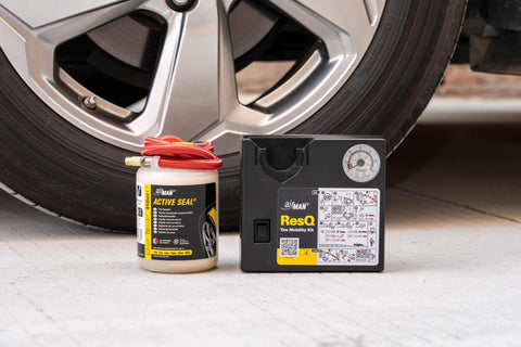 ResQ Tire Repair Kit With 12V Air Compressor And Cigarette Lighter Plug, Emergency Tire Repair Kit For Cars next to a wheel
