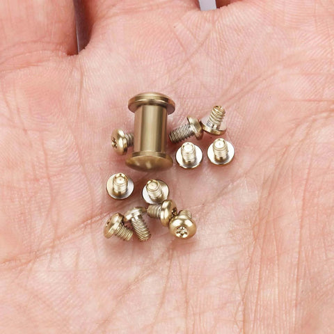 HiSpkNix Titanium Screw Set for Benchmade 535 Bugout, 533 Mini Bugout & 537 Bailout - Gold screws in hand