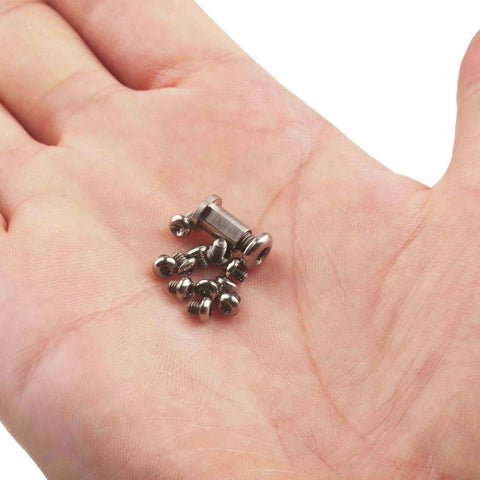 Hand holding 26Pcs Titanium Alloy Torx Screw Set Compatible with Benchmade 535 BUGOUT Knife (Titanium)