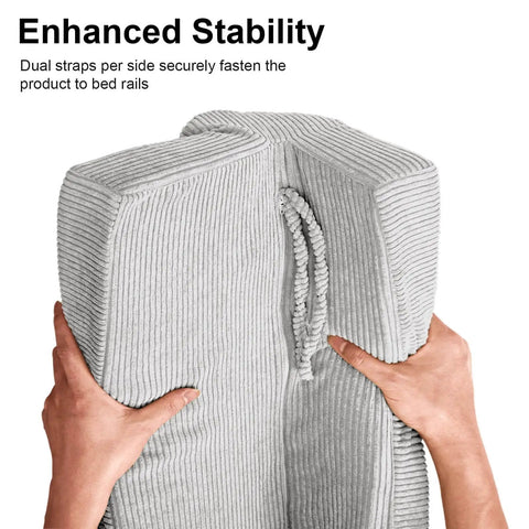 Hands holding Toddler Bed Rail Bumper Protector With Premium Memory Foam, soft gray cushion, and enhanced stability rope.